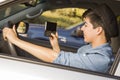 Mixed Race Woman Texting and Driving Royalty Free Stock Photo