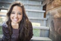 Mixed Race Young Adult Woman Portrait on Staircase Royalty Free Stock Photo