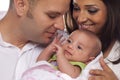 Mixed Race Young Couple with Newborn Baby Royalty Free Stock Photo