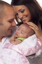 Mixed Race Young Couple with Newborn Baby