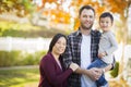 Mixed Race Young Family Portrait Outdoors Royalty Free Stock Photo