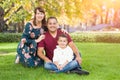 Mixed Race Young Family Portrait At The Park Royalty Free Stock Photo