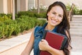 Pretty Mixed Race Girl Student with School Books On Campus Royalty Free Stock Photo