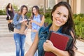 Mixed Race Young Girl Student with School Books On Campus Royalty Free Stock Photo