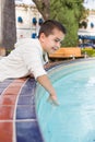 Mixed Race Young Hispanic and Caucasian Boy at a Water Fountain Royalty Free Stock Photo