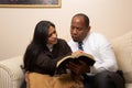 Mixed Raced Christian Couple Studying Bible Together