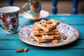 mixed raw nut bars on blue ceramic dish Royalty Free Stock Photo