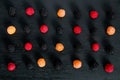 Mixed of red, black, yellow raspberries on table. Close up. Royalty Free Stock Photo