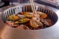 Mixed Roasted Meat and Seafood and Chopsticks on the BBQ Grill o Royalty Free Stock Photo