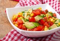 Mixed salad with avocado, tomatoes and sweet corn Royalty Free Stock Photo