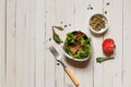 Mixed salad with Munga bean sprouts and pumpkin seeds, top view on light boards with space Royalty Free Stock Photo