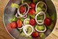 mixed salad of onions tomatoes and lettuce