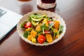 Mixed Salad with Fruit and Avocado on the table Royalty Free Stock Photo