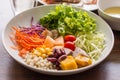 Mixed salad with tomatoes, corn, carrots, cantaloupe, red beans, millet, taro, cabbage, bananas, pumpkins and help lose weight.