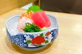 Mixed sashimi; hirame, salmon and tuna sashimi, served with wasabi