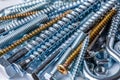 Mixed screws and nails. Industrial background. Home improvement.bolts and nuts.Close-up of various screws. Use for background, top