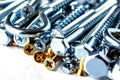 Mixed screws and nails. Industrial background. Home improvement.bolts and nuts.Close-up of various screws. Use for background, top