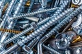 Mixed screws and nails. Industrial background. Home improvement.bolts and nuts.Close-up of various screws. Use for background, top Royalty Free Stock Photo