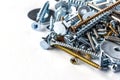 Mixed screws and nails. Industrial background. Home improvement.bolts and nuts.Close-up of various screws. Use for background, top