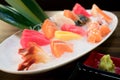 Mixed sliced fish sashimi on ice in white bowl. Sashimi Salmon T Royalty Free Stock Photo