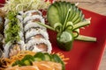 Mixed sushi roll and salmon sashimi Royalty Free Stock Photo