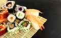 Mixed Sushi Rolls On A Slate Background Royalty Free Stock Photo
