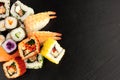 Mixed Sushi Rolls On A Slate Background Royalty Free Stock Photo
