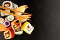 Mixed Sushi Rolls On A Slate Background Royalty Free Stock Photo