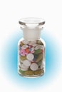 Mixed tablets in bottle, close up