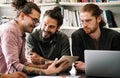 Mixed team of software engineers brainstorming ideas. Diverse app developers collaborating as group Royalty Free Stock Photo
