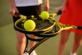 Mixed tennis, players with rackets and balls Royalty Free Stock Photo