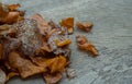 Mixed thai sweets made from sliced sweet potato coated with sugar Potato chip on rustic wooden background Royalty Free Stock Photo