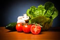 Mixed Vegetabales On Table In Front Of Black Background Royalty Free Stock Photo