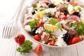 Mixed vegetable salad with rice, egg, onion, tomato and olive Royalty Free Stock Photo