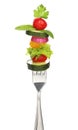 Mixed vegetables on a fork isolated. Royalty Free Stock Photo