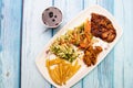 Mixed vegetables, mushroom with spicy chicken, fries, salad and sauce served in dish isolated on grey background top view food Royalty Free Stock Photo