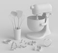 Mixer and cookie cutters with kitchen utensil for making cookies on monochrome Royalty Free Stock Photo