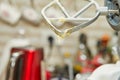 Mixer with dripping dough after beating Selective focus Royalty Free Stock Photo