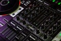 Mixer section of Pioneer DJ Controller in music store shiny new knobs