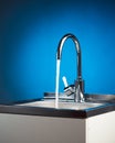 Mixer tap with flowing water Royalty Free Stock Photo