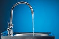 Mixer tap with flowing water Royalty Free Stock Photo