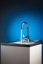 Mixer tap with flowing water Royalty Free Stock Photo