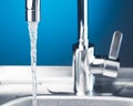 Mixer tap with flowing water Royalty Free Stock Photo