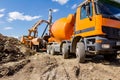 Mixer truck at the construction site, pouring to pump for concrete