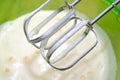 Mixer Whisks and Whipped Eggs in Bowl