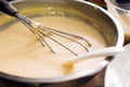 Mixing batter or dough for pancake or making desserts.Close up , Royalty Free Stock Photo