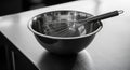 Mixing Bowl With Whisk minimal composition in restaurant prep table Royalty Free Stock Photo