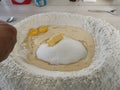 Mixing bread at home by hand flour sugar eggs butter