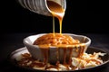 mixing caramel sauce into a delicious dessert