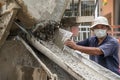 Mixing cement concrete at construction site Royalty Free Stock Photo